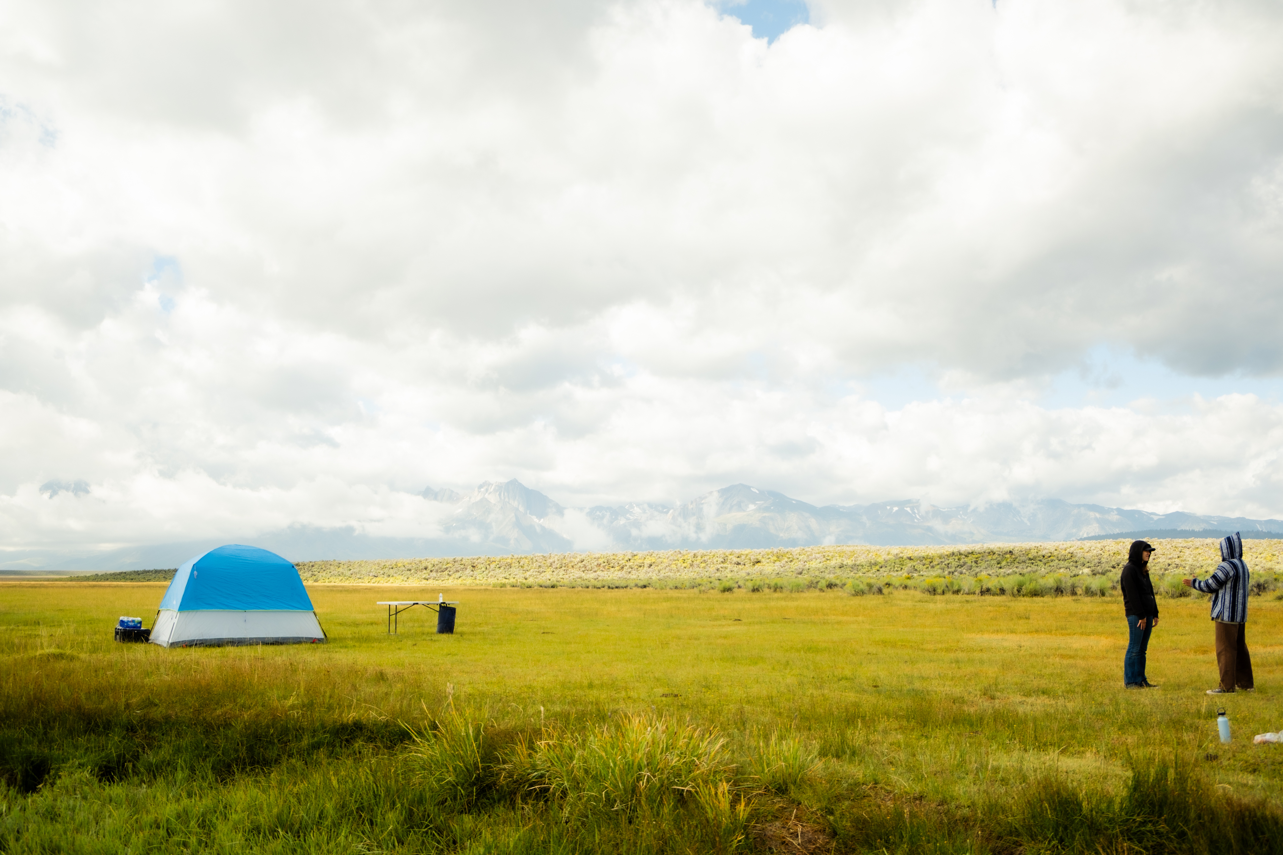 Outdoor camping tent lifestyle photography in a grassy mountain meadow by San Diego outdoor photographer Kanyon Studio
