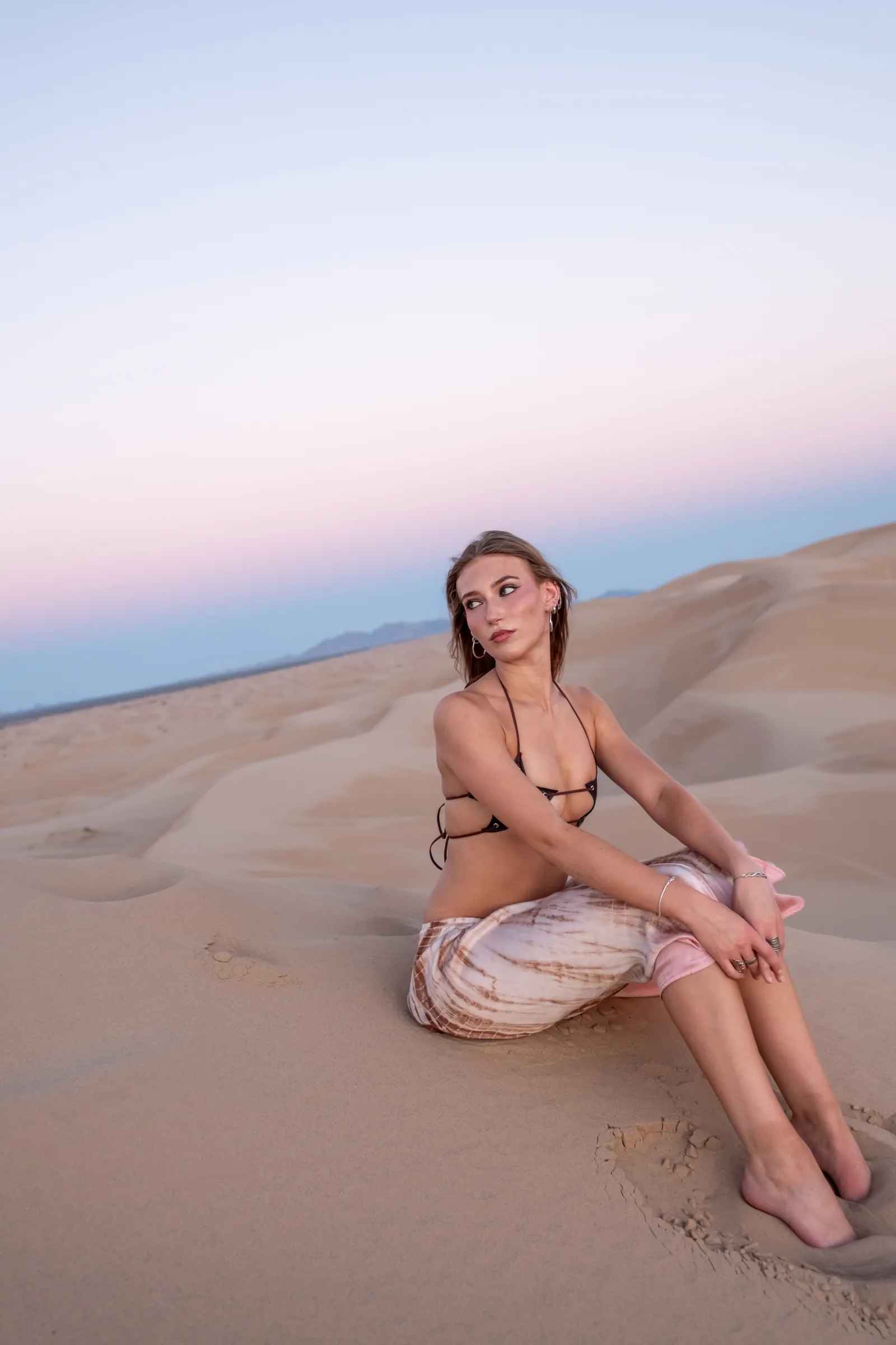 Over-the-shoulder portrait from Kanyon Studio's desert portrait session