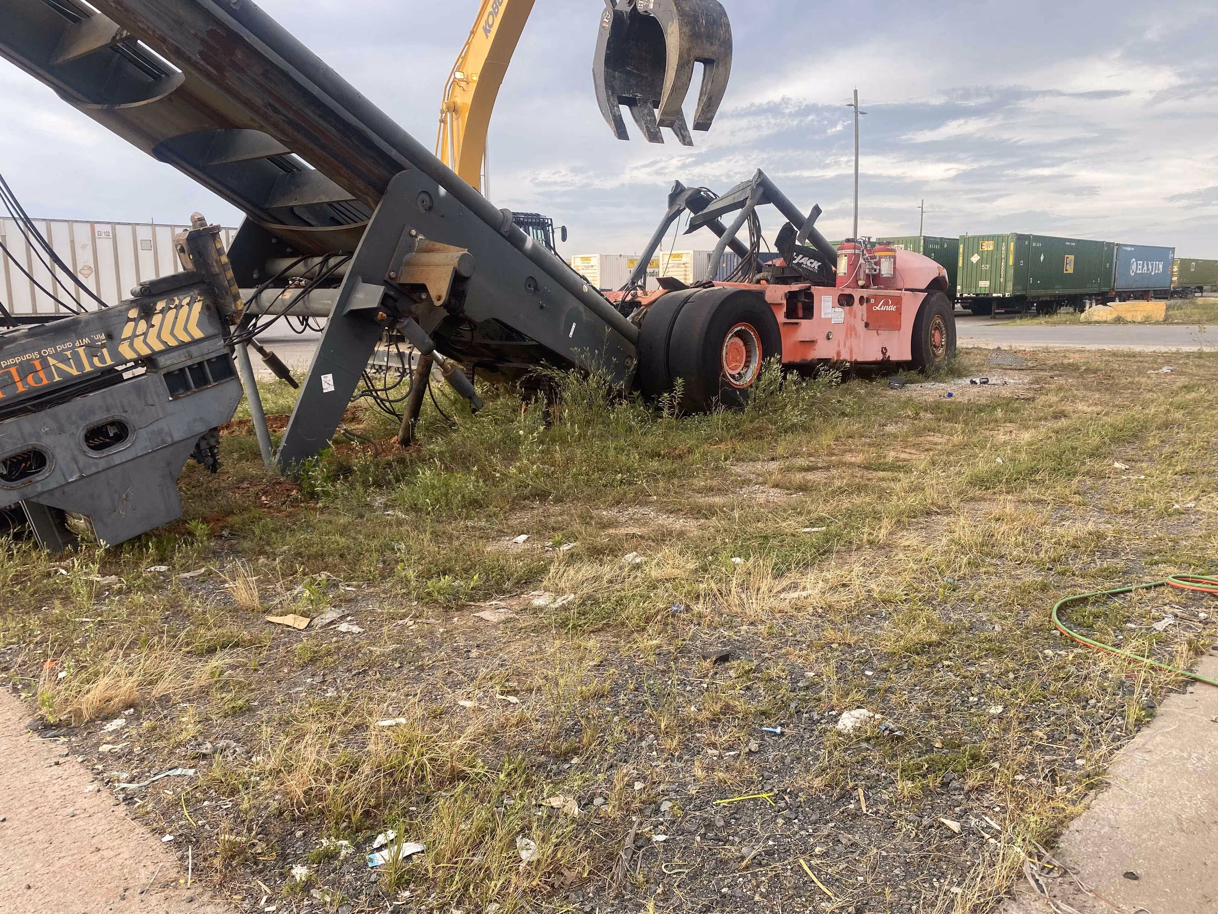 A forklift shown ready to pick up recycling.
