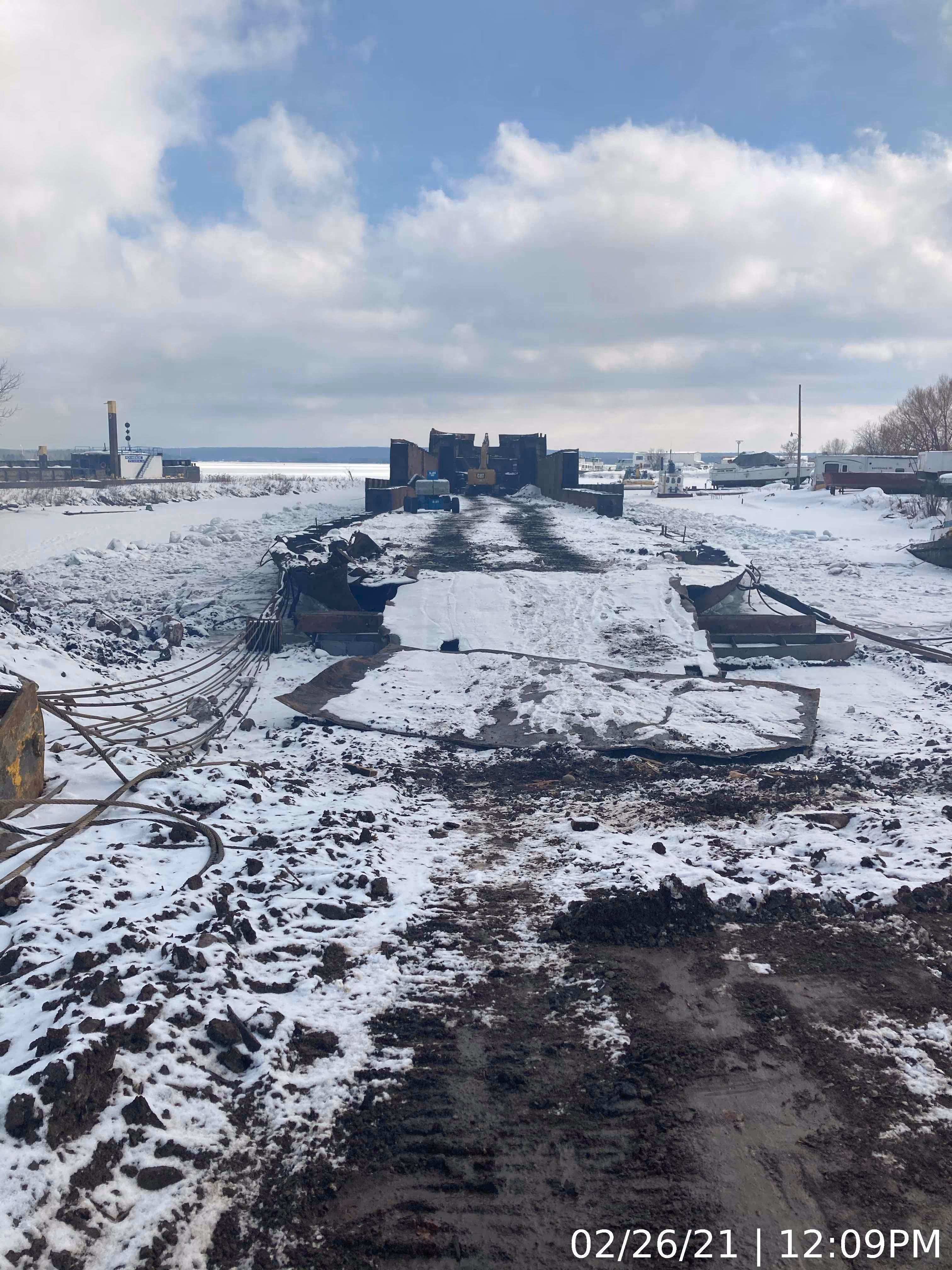 An imprint of a large ship that has been deconstructed and removed.