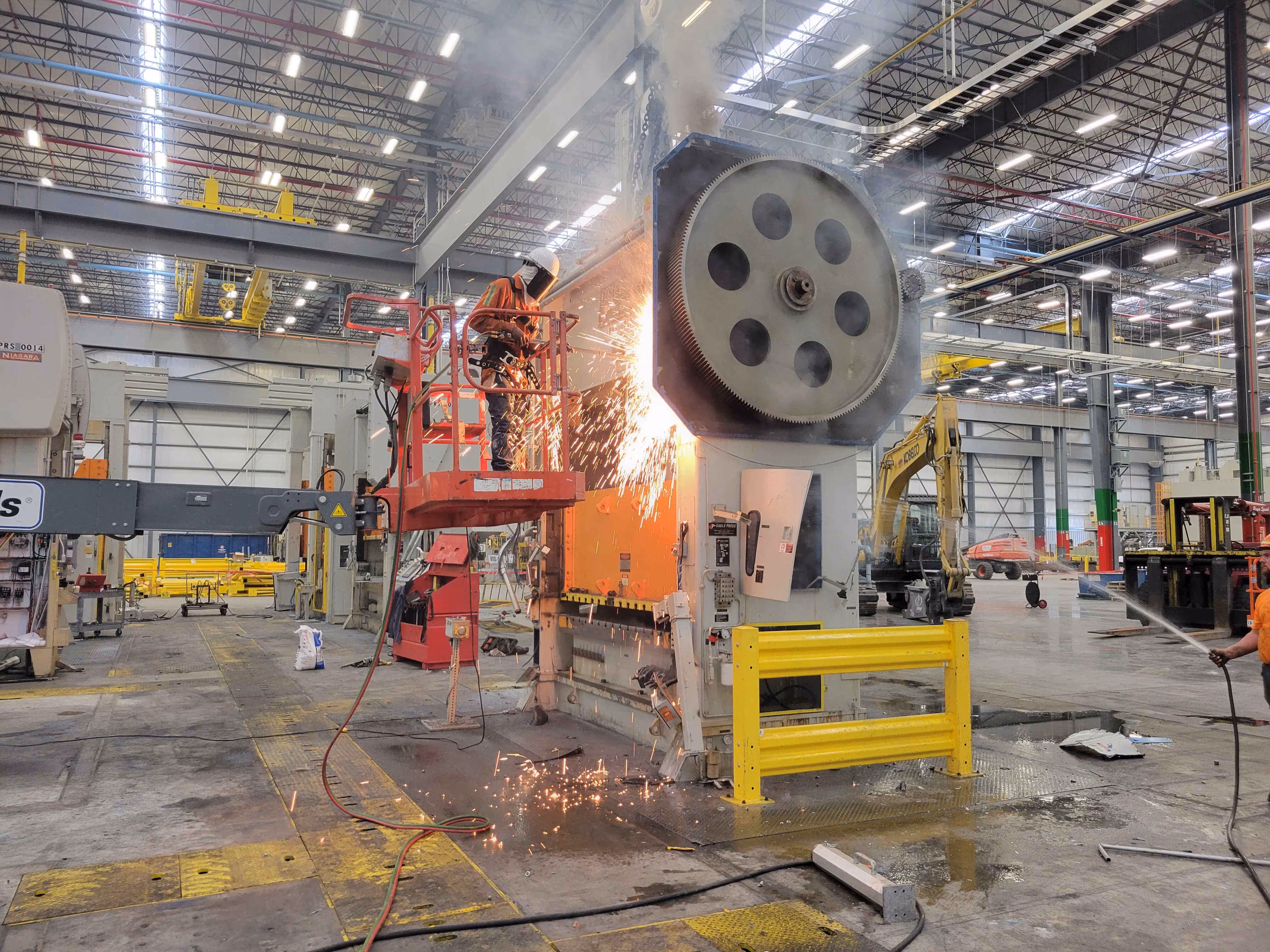 Large mechanical press undergoing dismantling