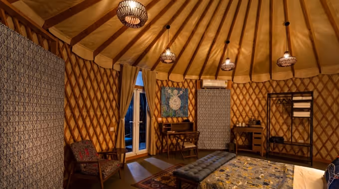 Modern luxury yurts by The Out Factory nestled in lush forest at Machaan eco-resort, Nagarhole