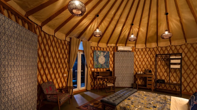 Modern luxury yurts by The Out Factory nestled in lush forest at Machaan eco-resort, Nagarhole