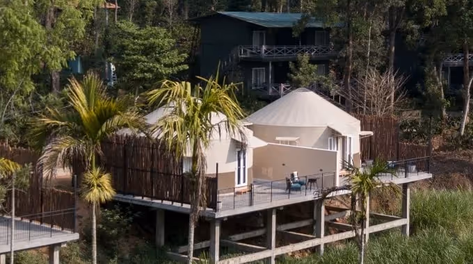 Modern luxury yurts by The Out Factory nestled in lush forest at Machaan eco-resort, Nagarhole