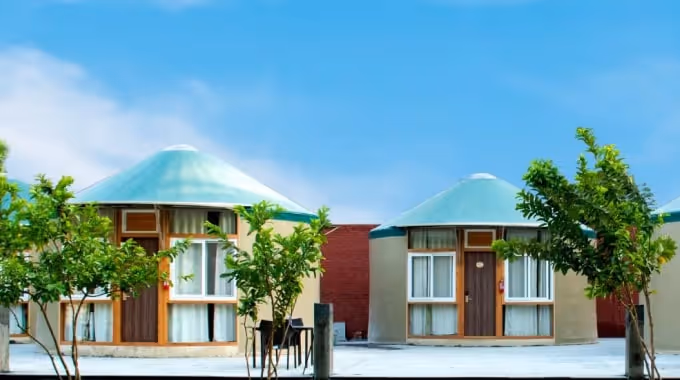 Eco-friendly luxury yurt resort with modern accommodations and green surroundings