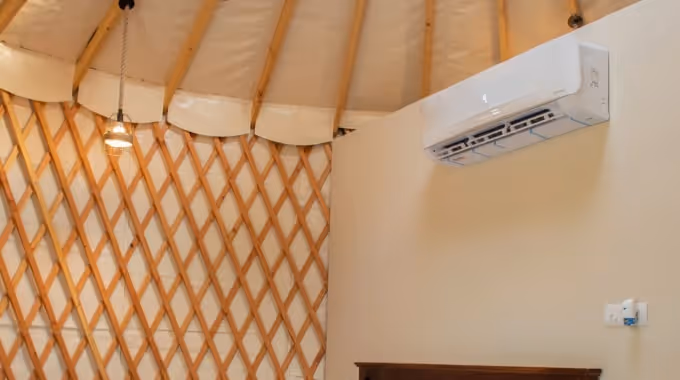 Eco-friendly luxury yurt resort with modern accommodations and green surroundings