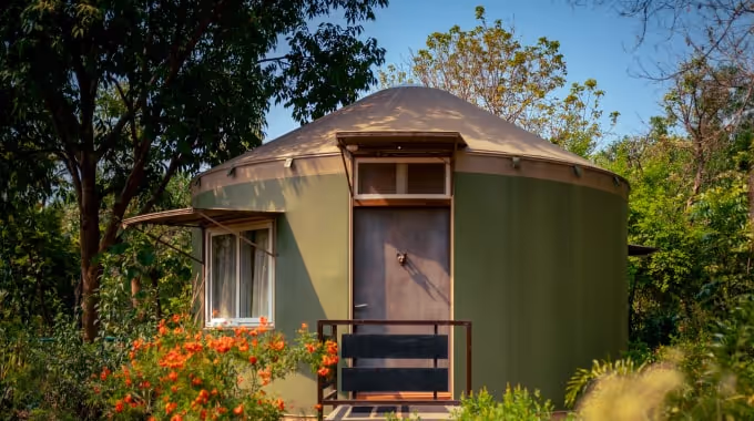 Luxury yurt interior with eco-friendly design and premium amenities at Tathastu Jungle Resort