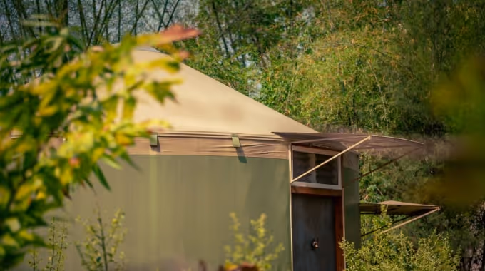 Luxury yurt interior with eco-friendly design and premium amenities at Tathastu Jungle Resort