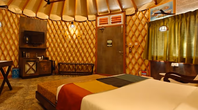 Luxury yurt interior with eco-friendly design and premium amenities at Tathastu Jungle Resort