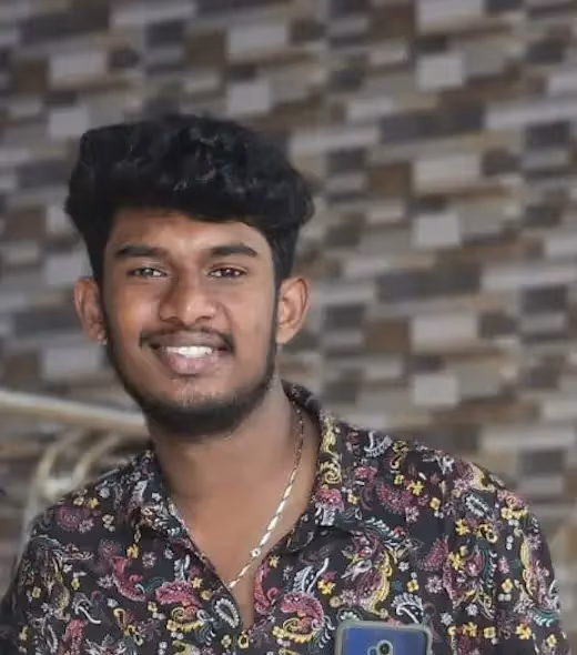 Digital Media Manager at The Out Factory in front of a yurt, working on a laptop.