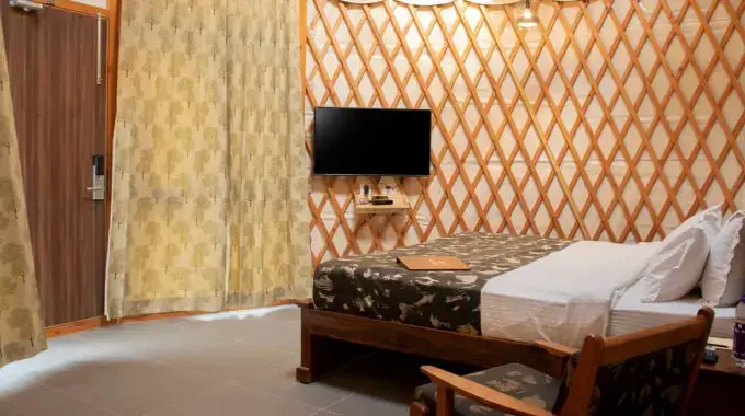 Eco-friendly luxury yurt resort with modern accommodations and green surroundings