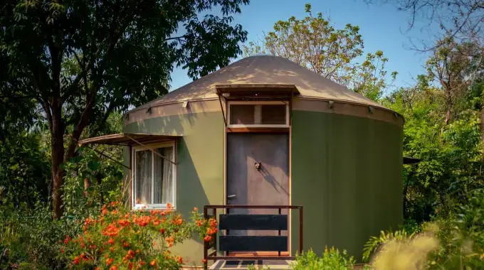 Luxury yurt interior with eco-friendly design and premium amenities at Tathastu Jungle Resort