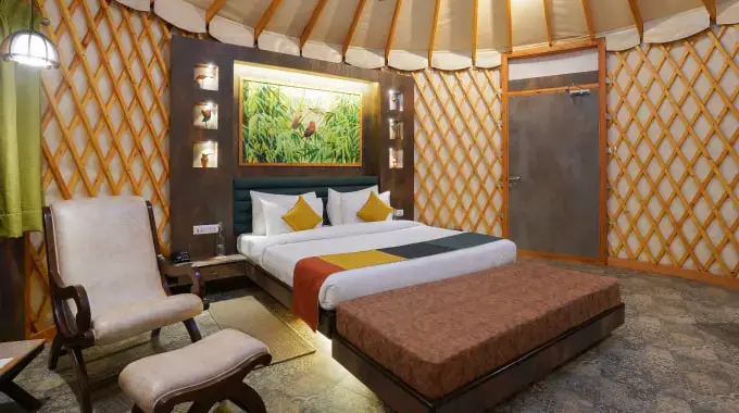 Luxury yurt interior with eco-friendly design and premium amenities at Tathastu Jungle Resort