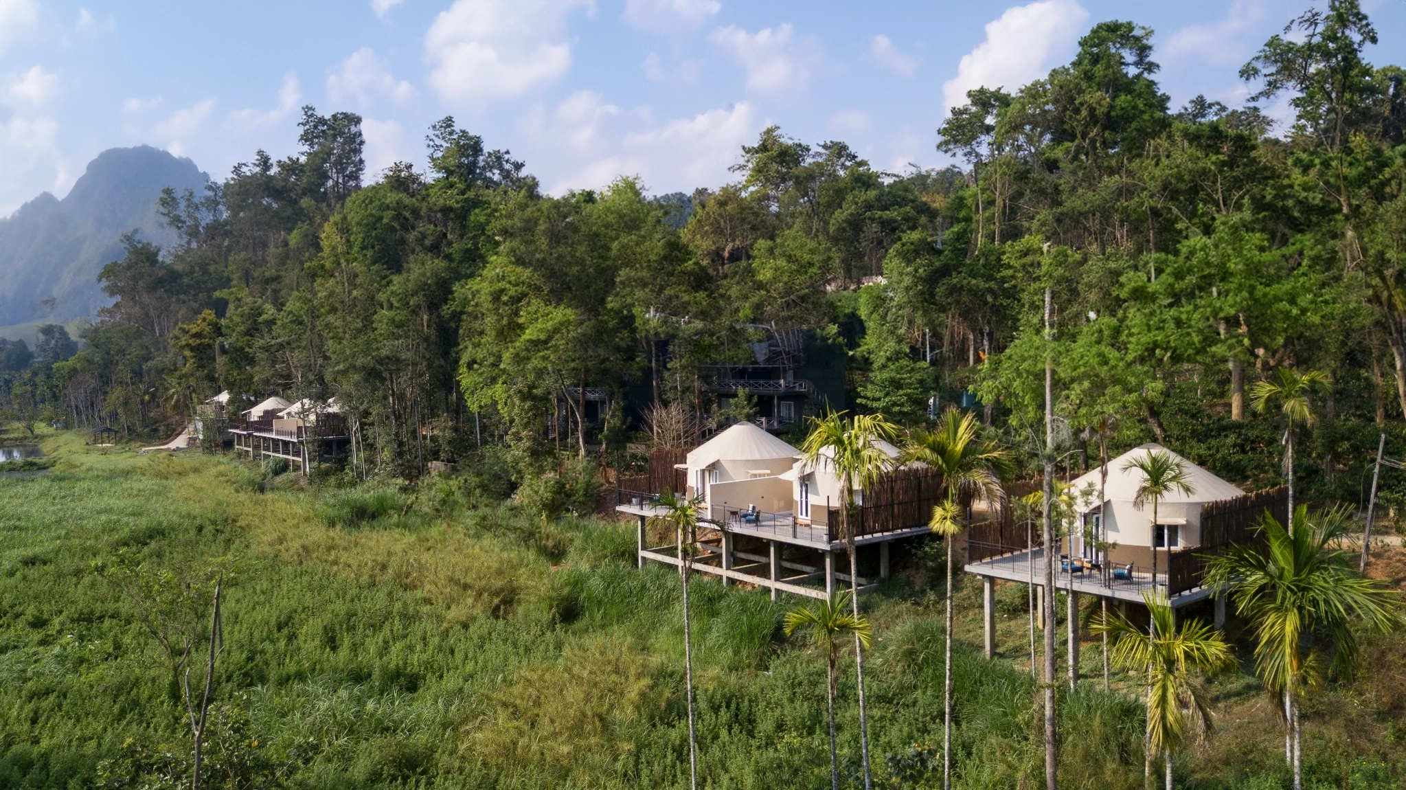 Modern luxury yurts by The Out Factory nestled in lush forest at Machaan eco-resort, Nagarhole