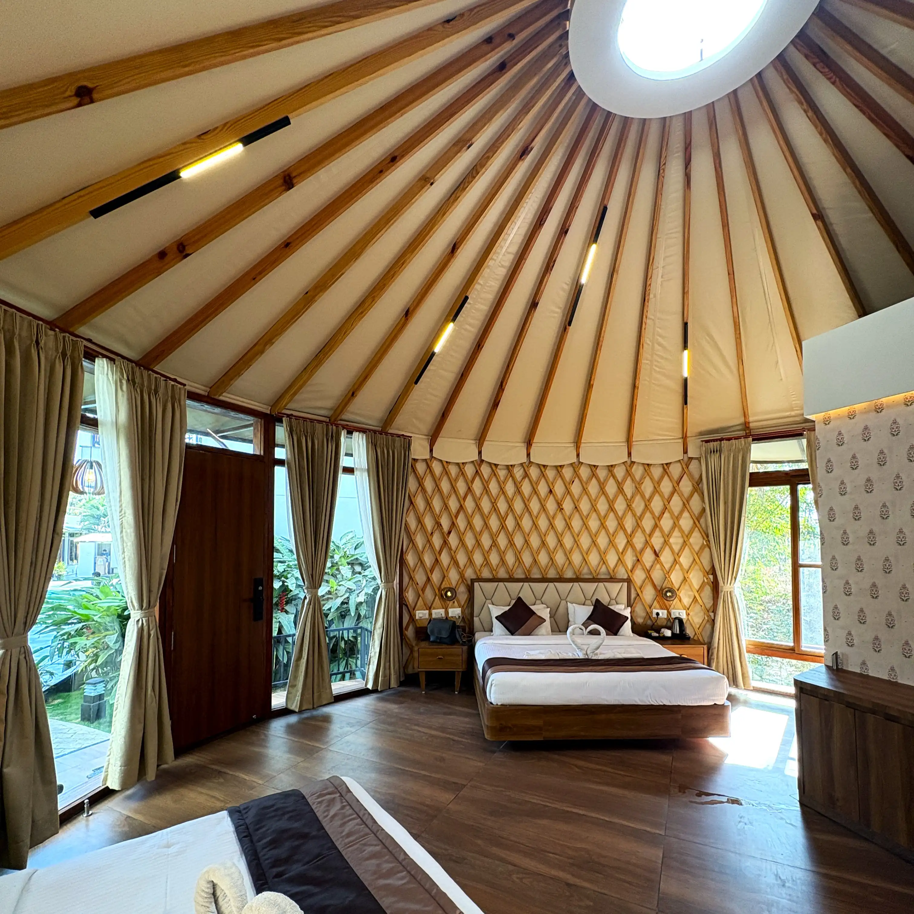 Eco-friendly luxury yurt resort with modern accommodations and green surroundings