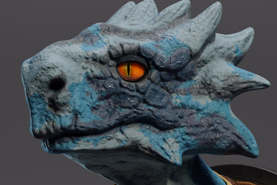 Close-up of a textured dragon head sculpture with blue-gray scaled skin and a vivid orange eye with a vertical slit pupil.