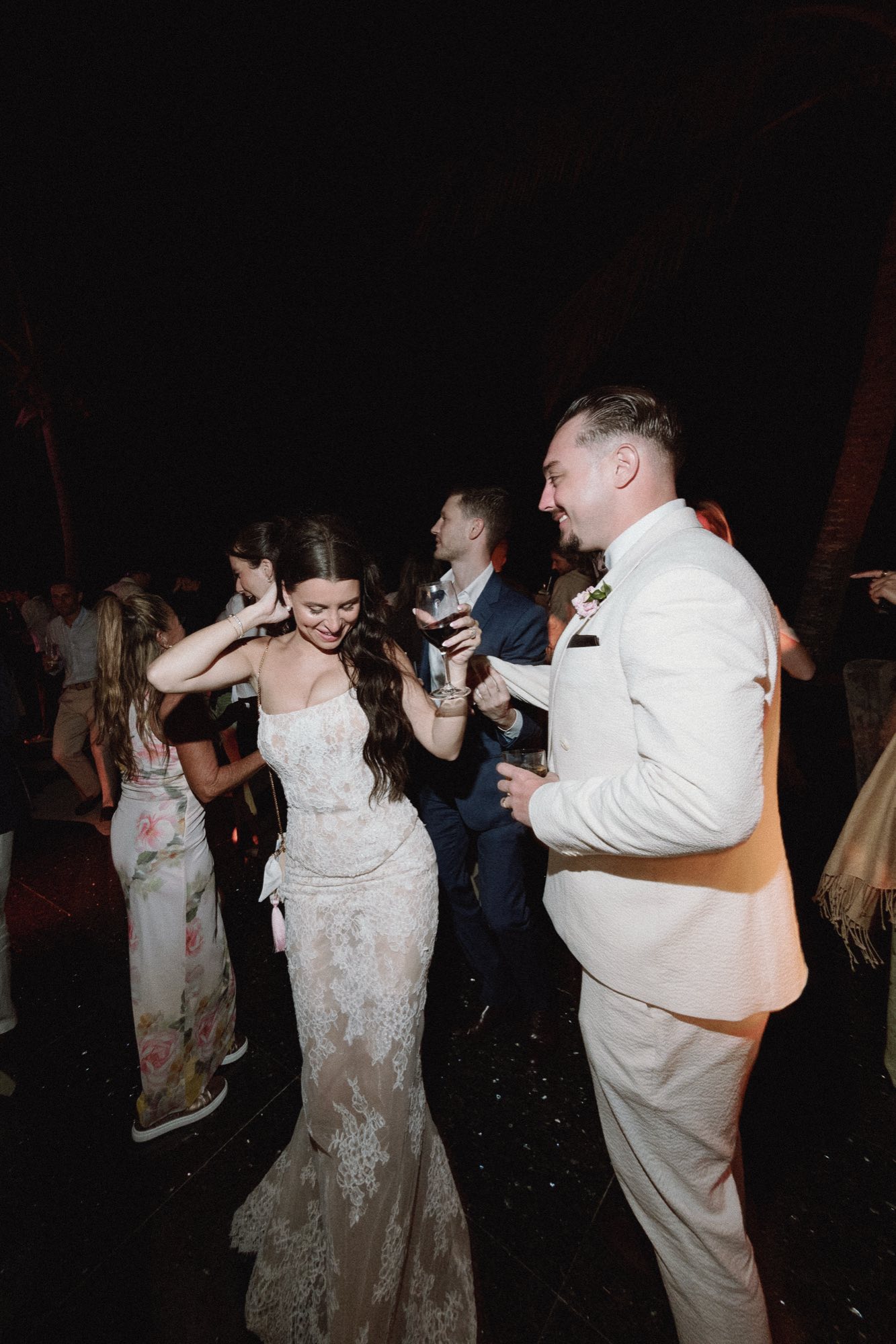 Dynamic candid of bride and groom dancing at Bermuda wedding reception