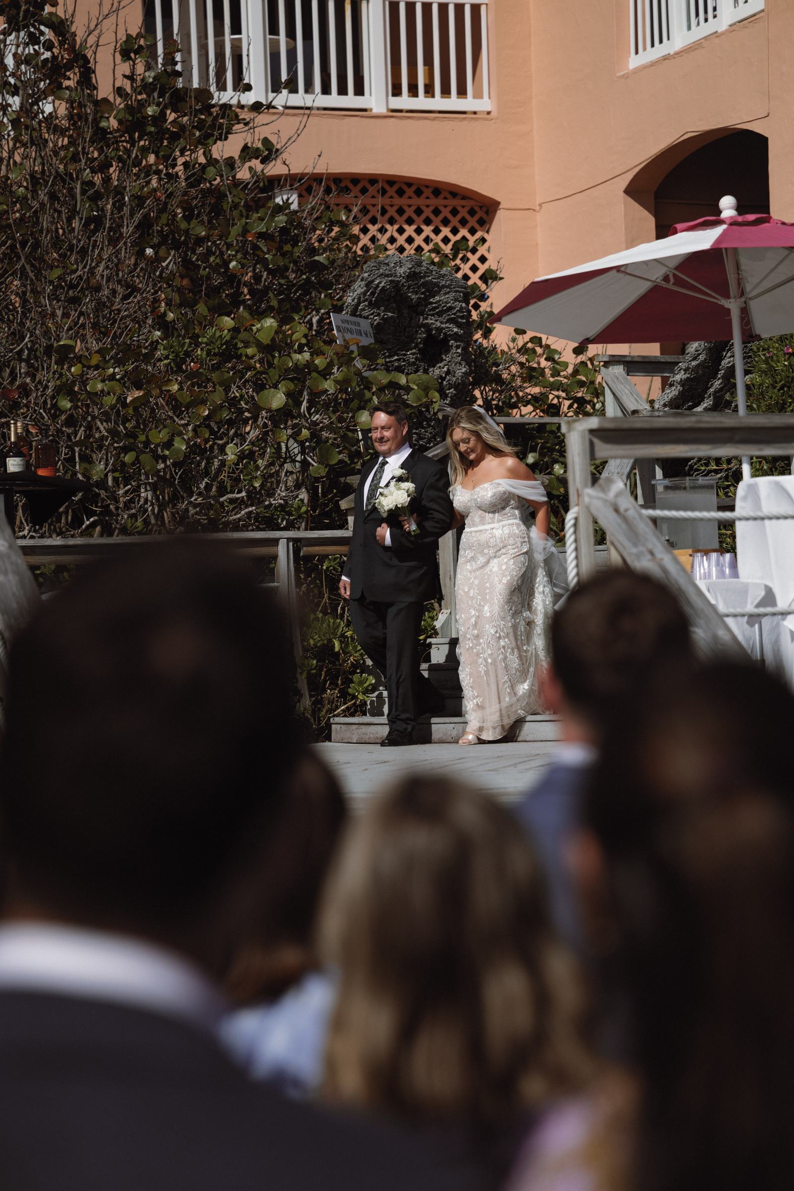 Emotional guest reactions during outdoor Bermuda wedding ceremony