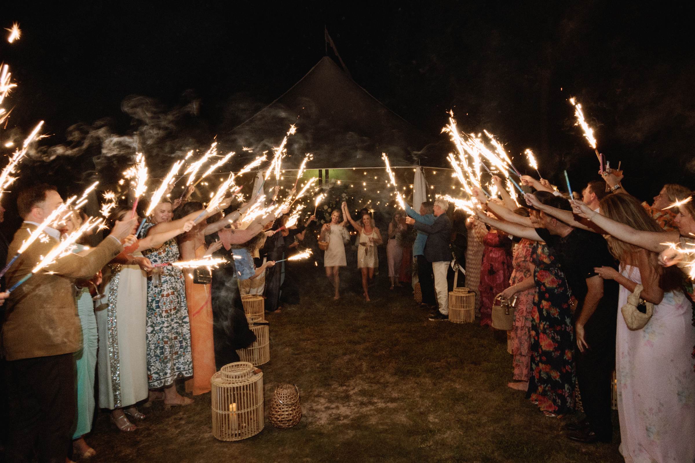 Sparkler exit through a tunnel of guests at a Bermuda wedding