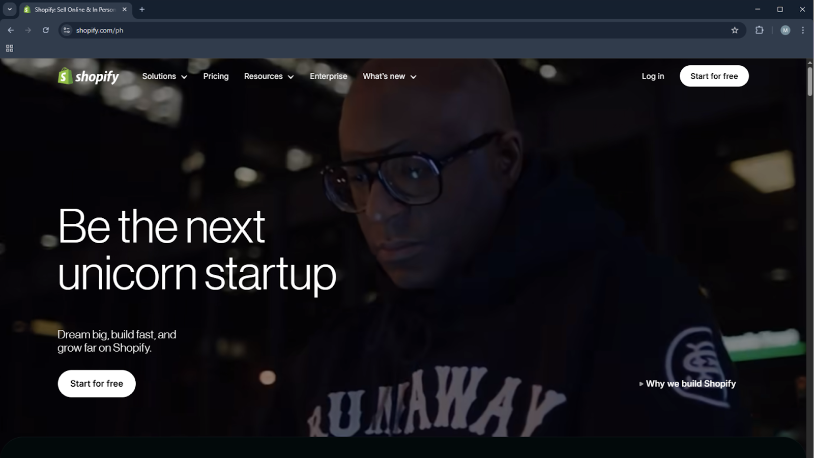 Shopify homepage highlighting startup growth message with call-to-action buttons for free trial and enterprise solutions - Wolf IQ