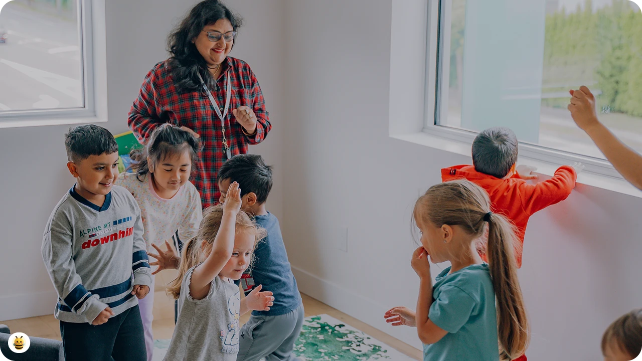 A woman is playing with kids
