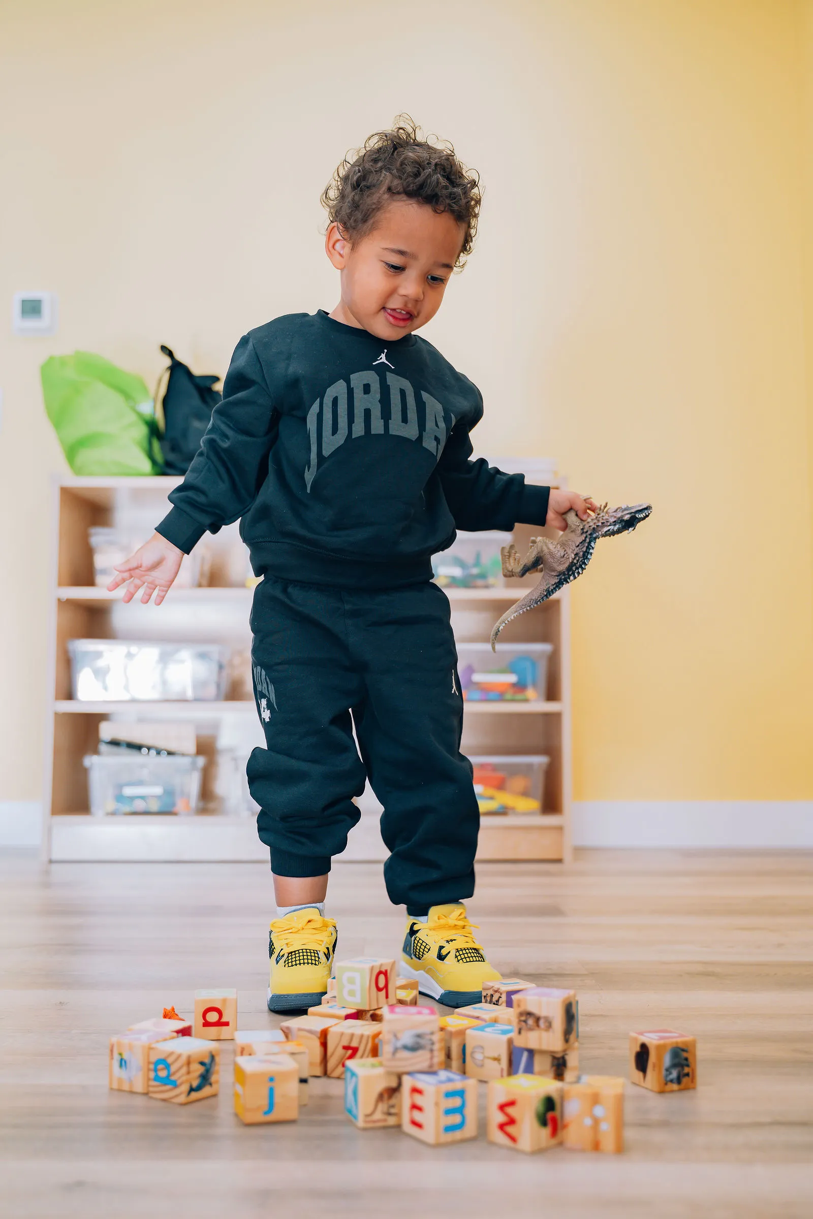 Child exploring hands-on STEM activity—Montessori preschool in South Surrey & Langley with ECE educators