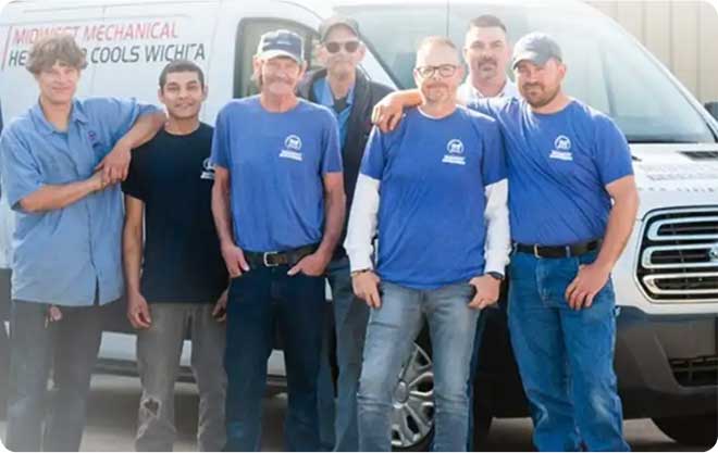 Technician working on a ceiling AC vent