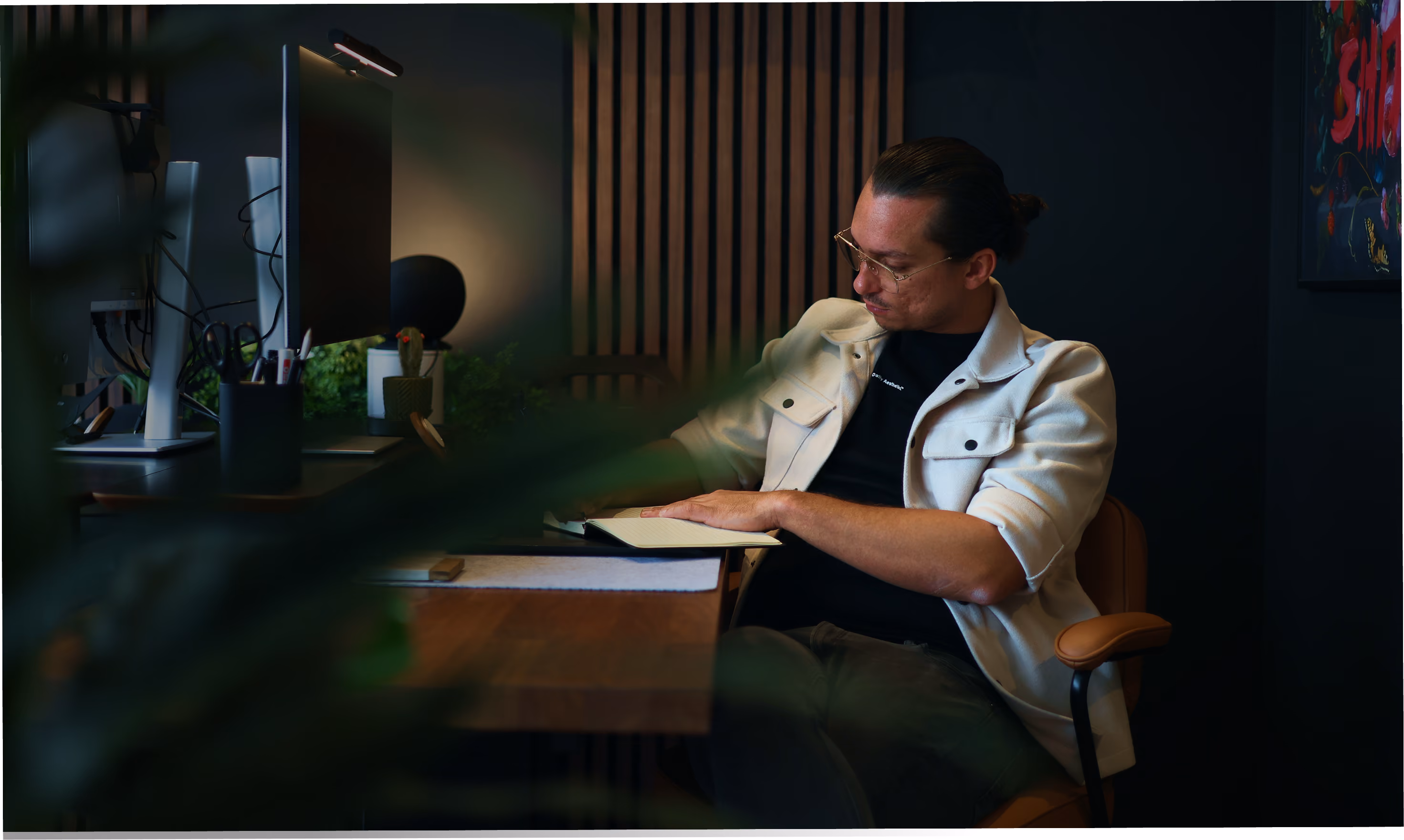 Robin sketching at his desk