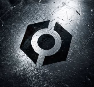 Core Industrial logo mark embossed on a scratched metal surface