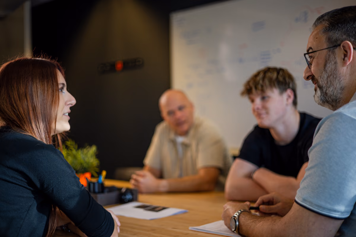 Client team in a meeting, photographed by Digitalmakers