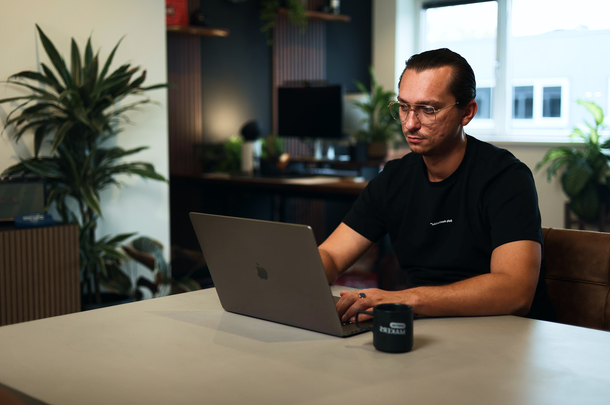 Robin working on a laptop in the Digitalmakers office
