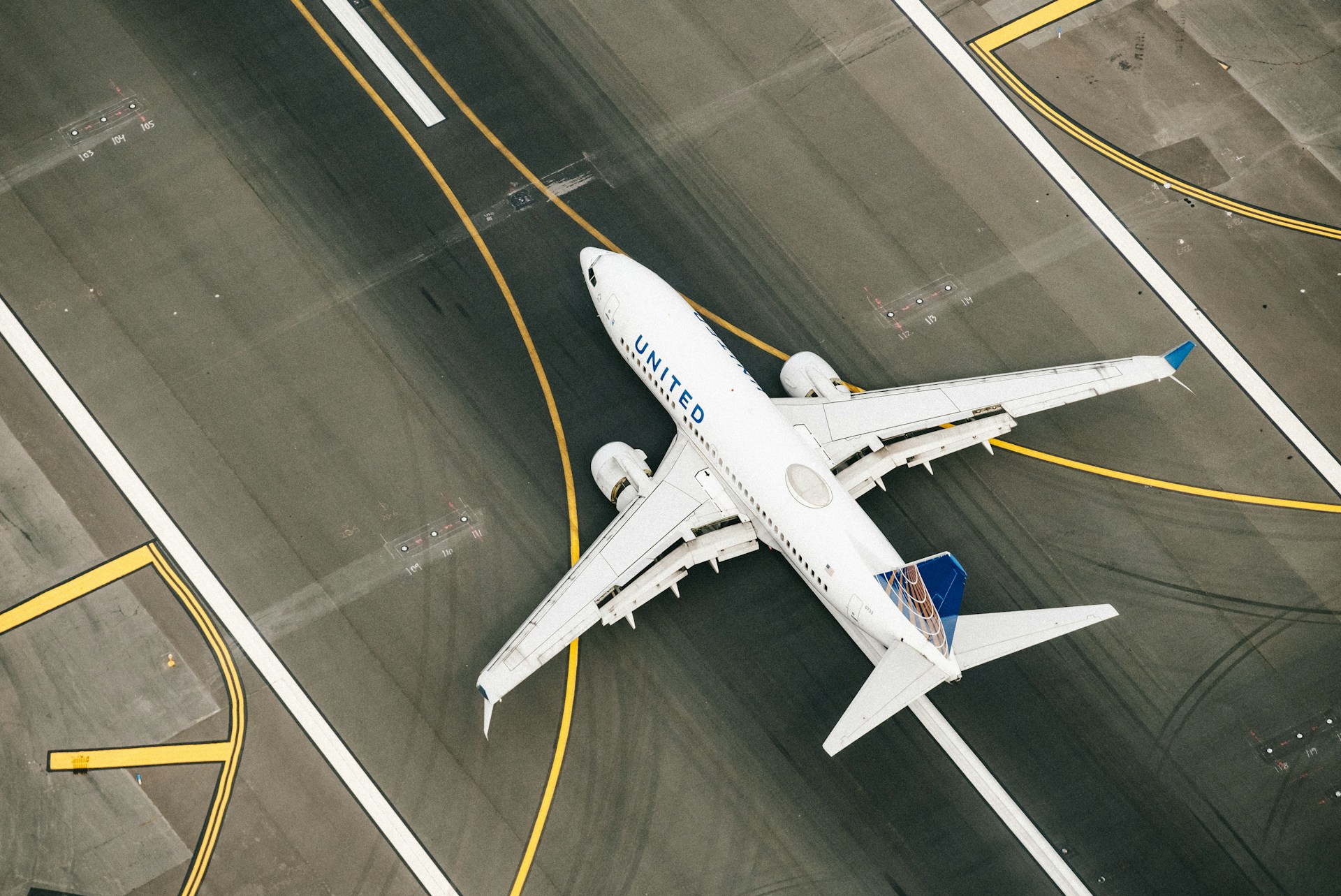 White airplane on runway