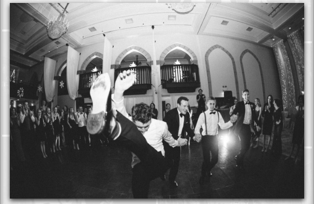 men dancing at Christmas wedding with Bentley Boys live music