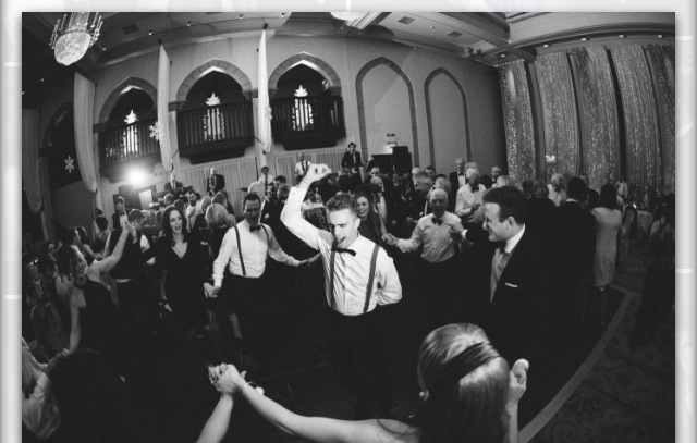 Crowd dancing at bentley boys Christmas wedding in Dromoland Castle