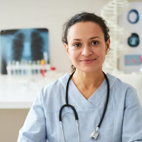 a woman wearing scrubs with a stethoscope