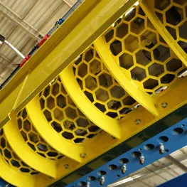 A yellow and blue rack in a warehouse.