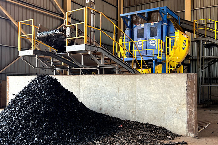 Dual-Shear® M120 with trommel screen processing truck tires.