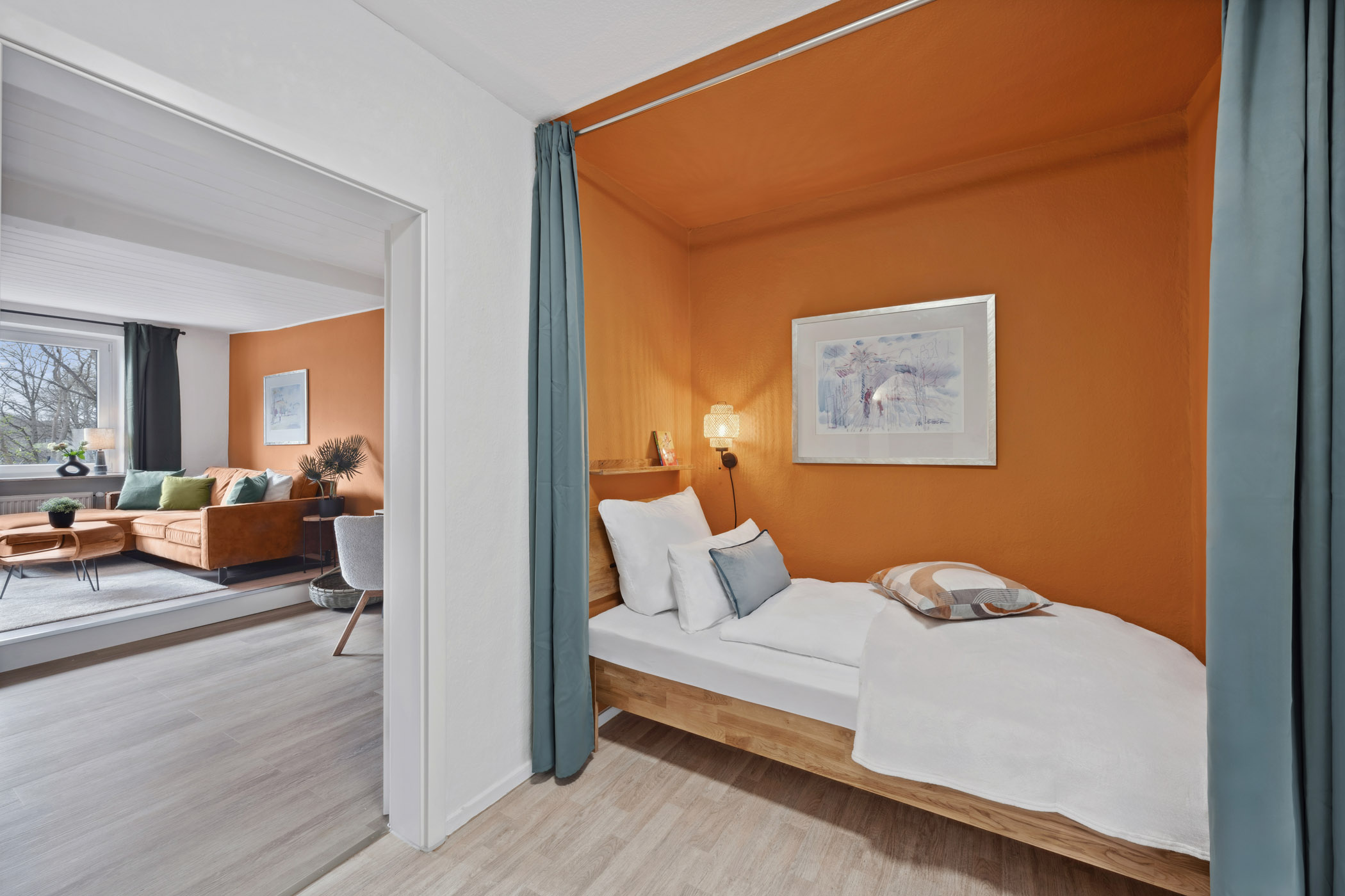 Einzelbett der Ferienwohnung Sperling in einer abgetrennten Schlafnische