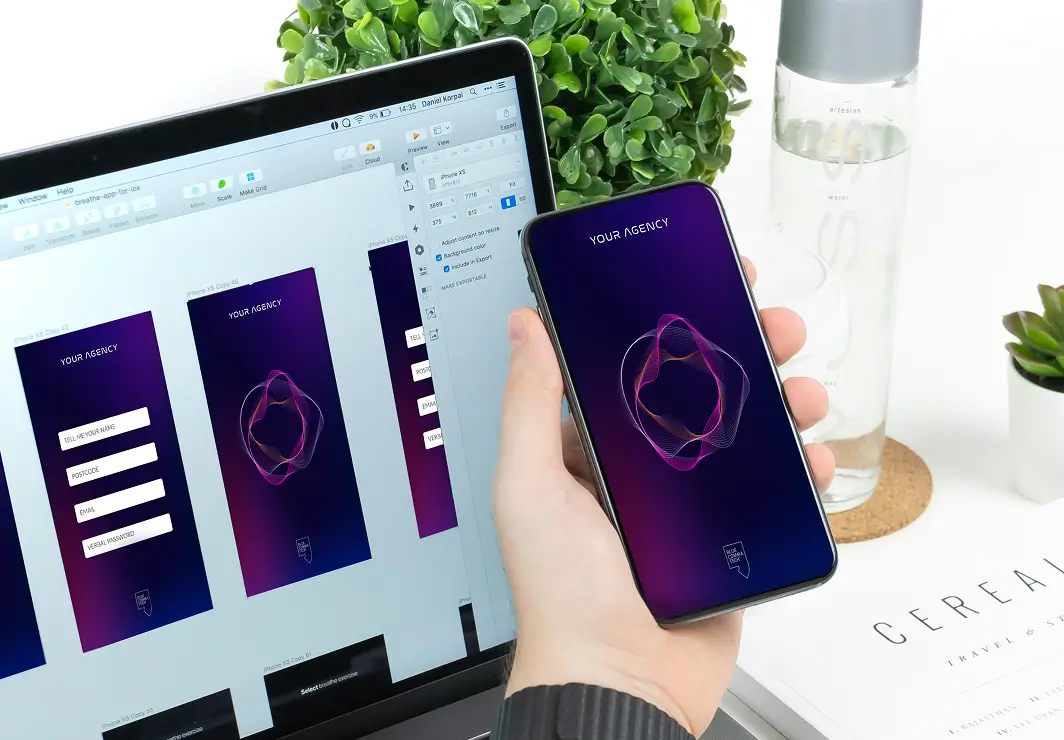 A Hand Holding a Phone with Blue Comma AI assistant