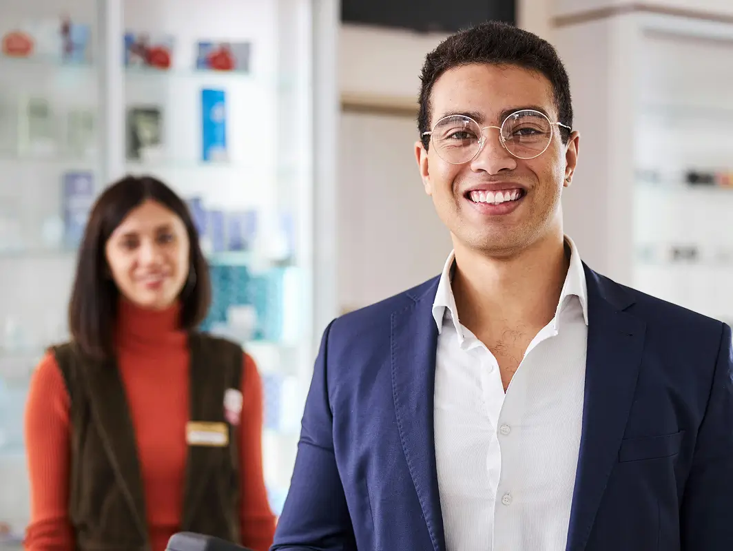 A Hand Holding a Phone with Blue Comma AI assistant