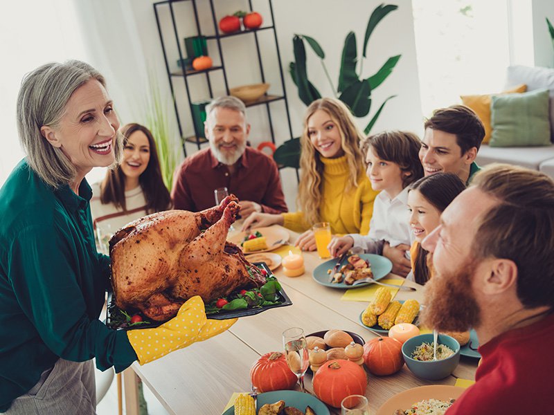 family eating thanksgiving meal