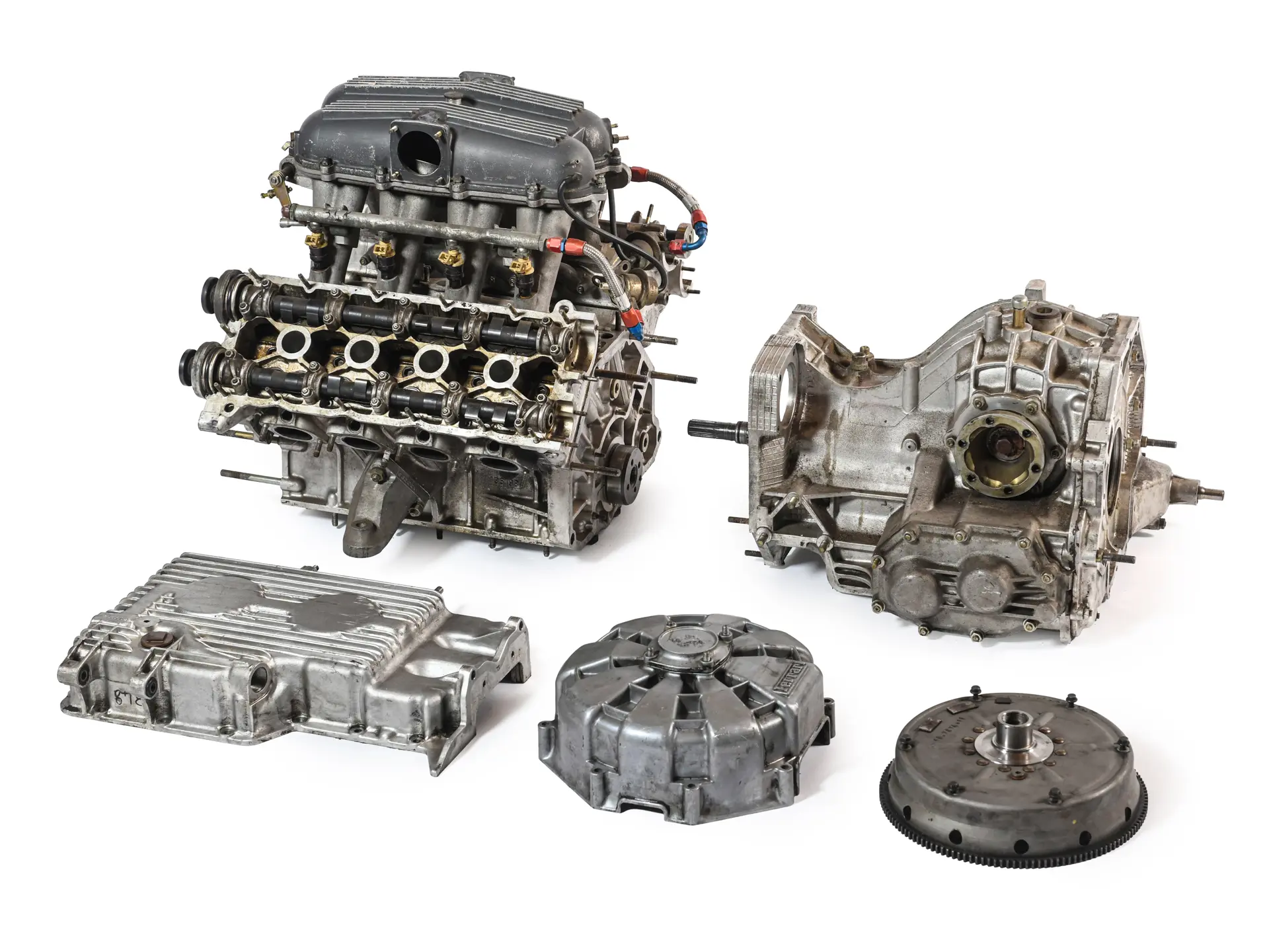 Moteur, boîte de vitesses et composants démontés de Ferrari 348.