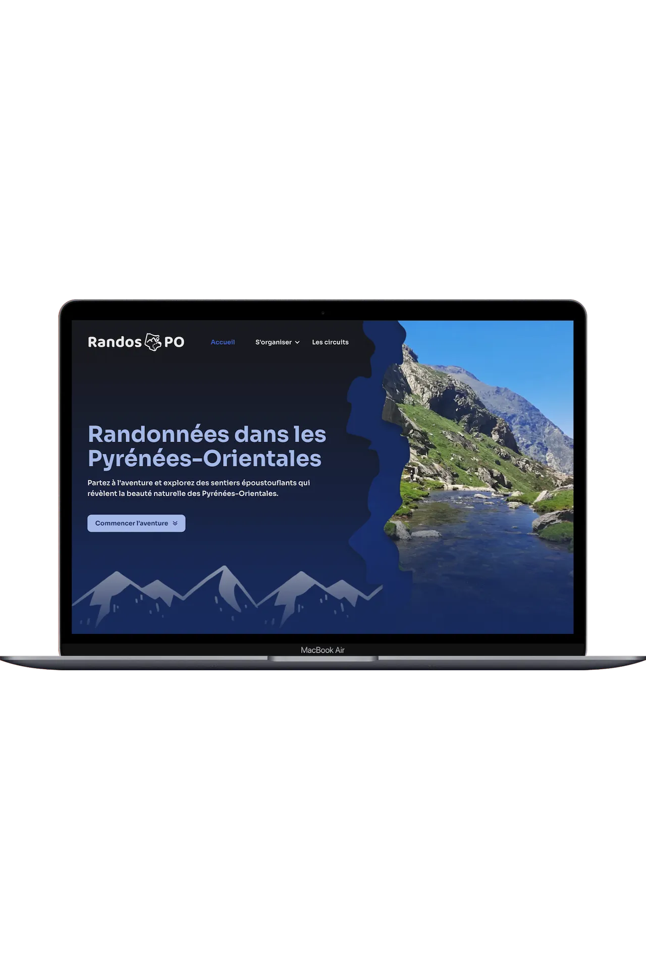 Un Macbook affichant le site web d'un club de randonnées dans les Pyrénées-Orientales
