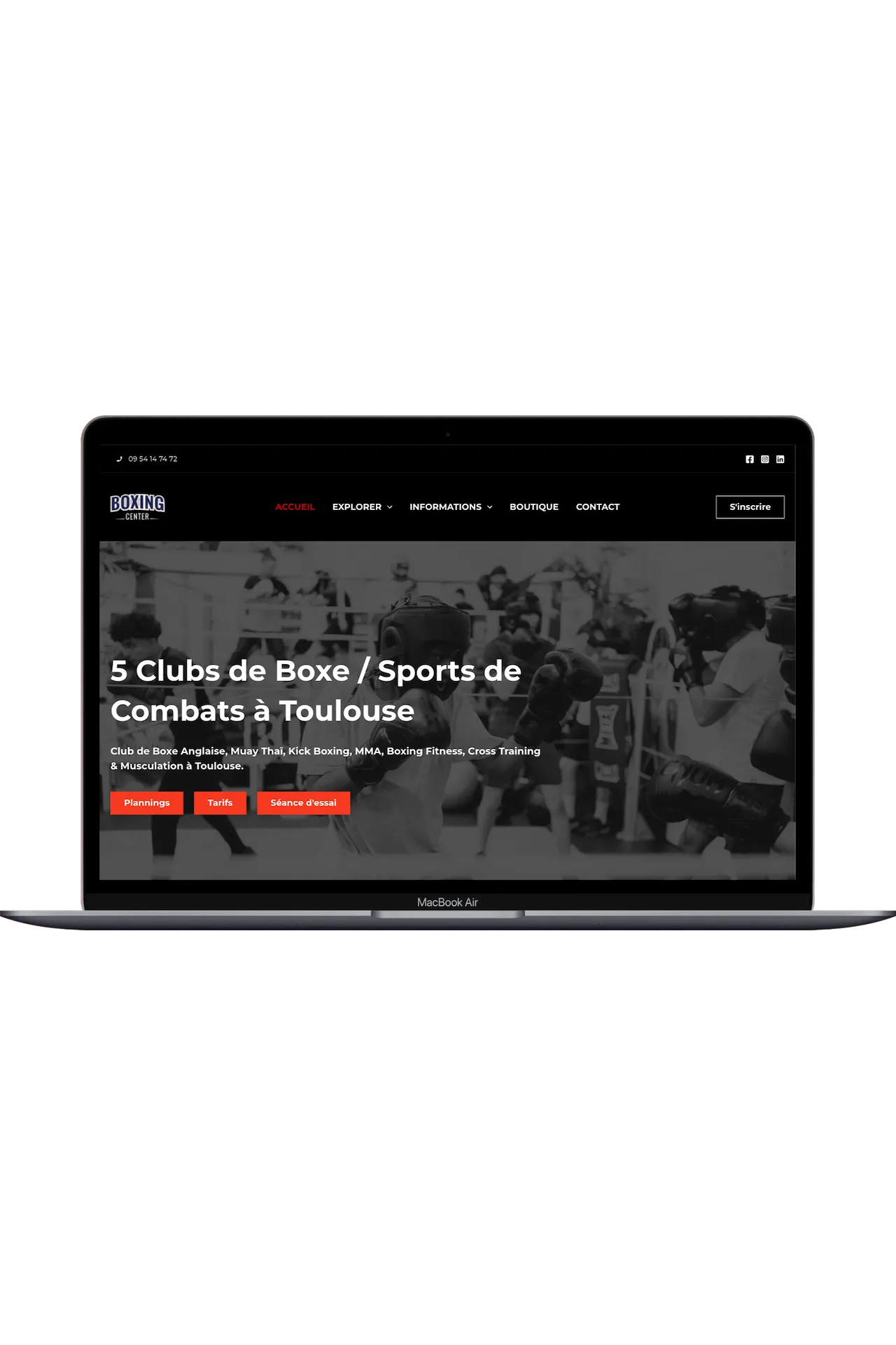 Un Macbook affichant le site web d'un club de boxe toulousain