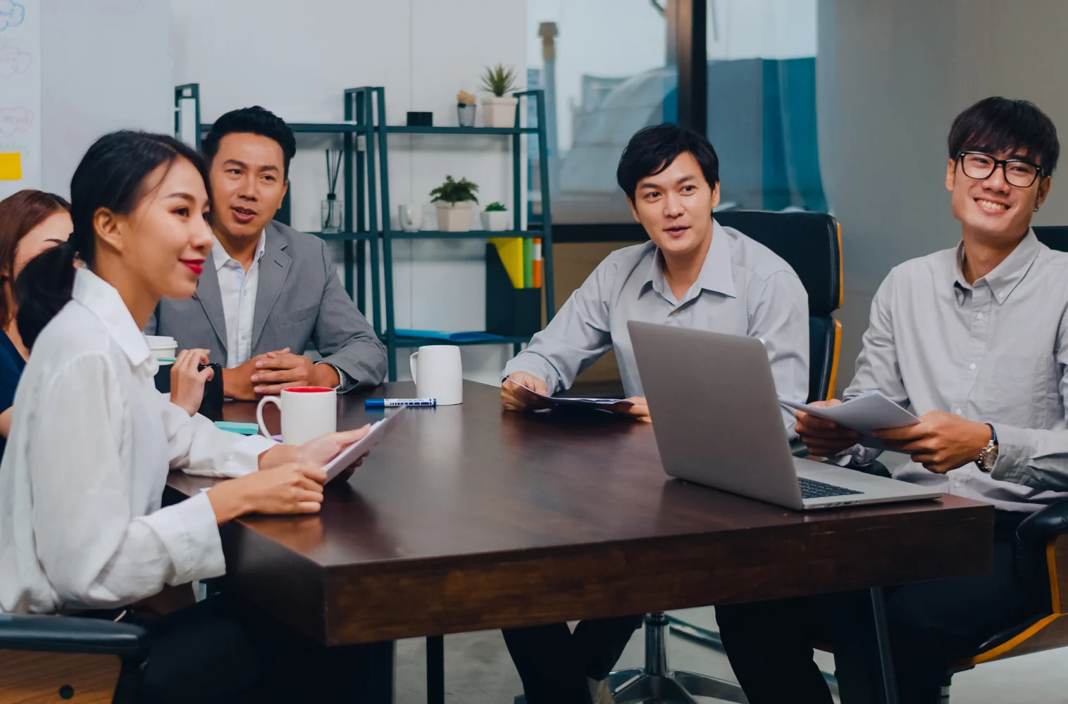 Startup team smiling after discovering affordable media coverage