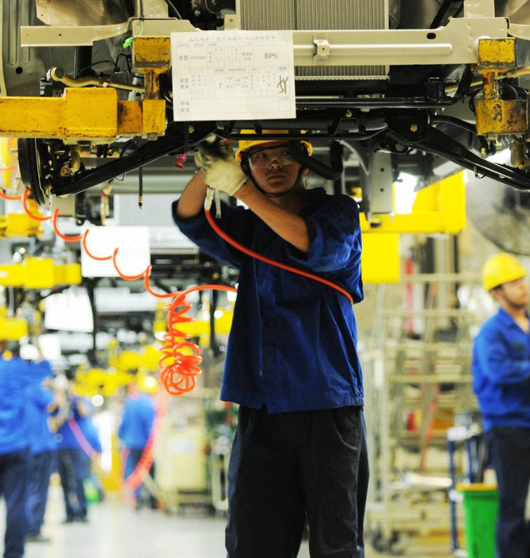 China’s Manufacturing Shows Signs of Recovery in September Despite Official Contraction