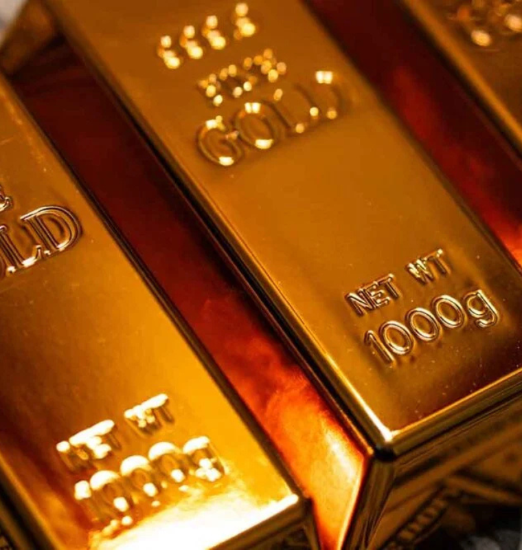 Gold Surges as Oil Drop and Iran Talks Cool Inflation Pressures