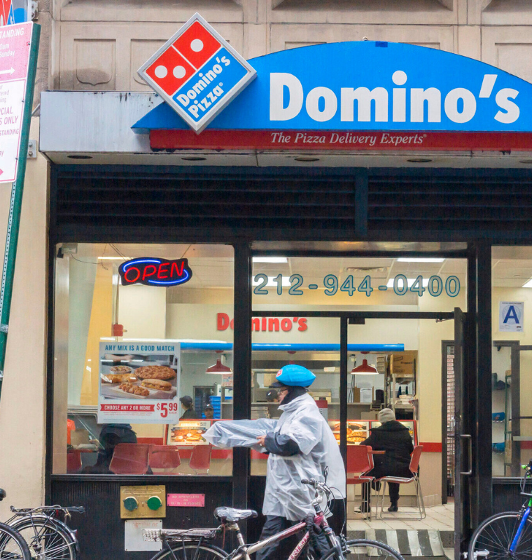 Domino’s Shares Slide as Weak Sales Signal Broader Fast-Food Slowdown