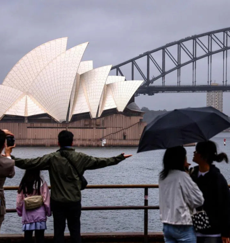 Australia’s Economic Growth Slows as Weak Consumer Spending and Weather Disruptions Take a Toll