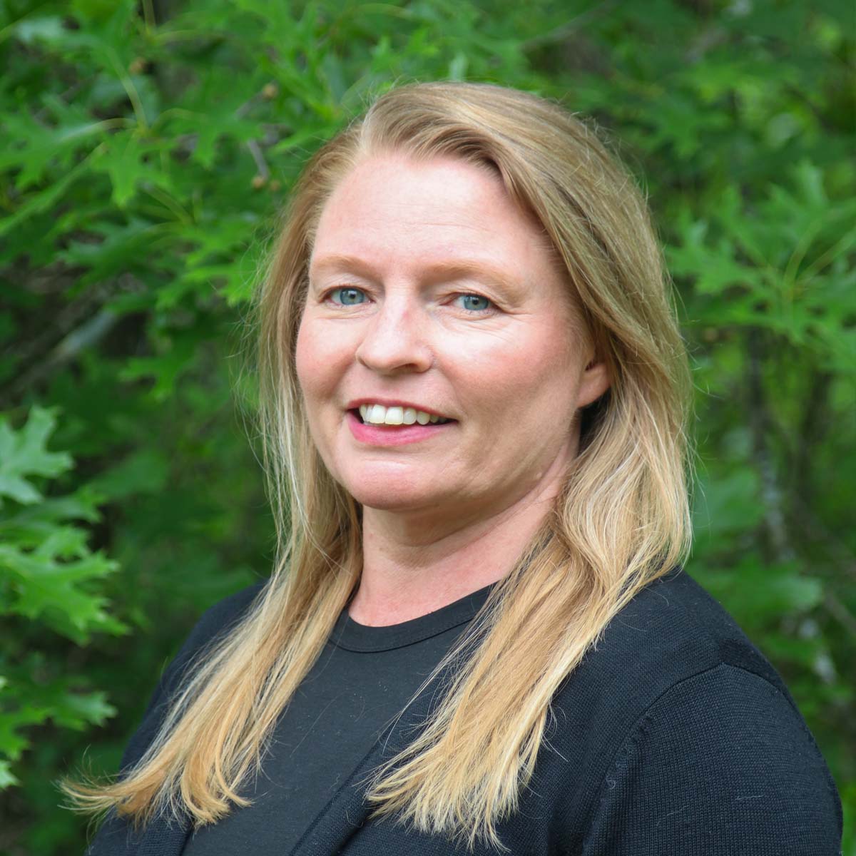 Professional headshot of Sasha Burgstaler.